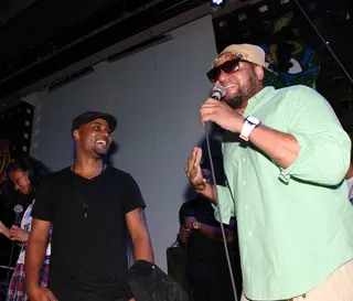 All Fun - George Tandy Jr. and Music Matters host Buttah Man share a few laughs on stage in between performances.(Photo: Bennett Raglin/BET/Getty Images for BET)