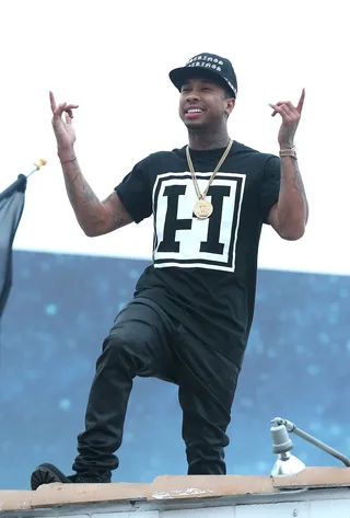 On Top of the World - Tyga shoots a music video on the roof of Los Angeles clothing store Last Kings before the set was shut down by the LAPD.(Photo: Splash News)