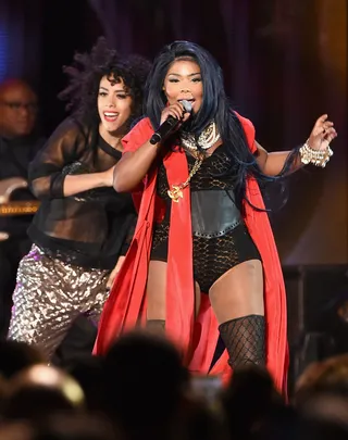 Bang This in Your Whip!  - Pint sized MC Lil’ Kim hits the stage with killer choreography to open the “Ladies Night” reunion.&nbsp;(Photo: Ethan Miller/BET/Getty Images for BET)