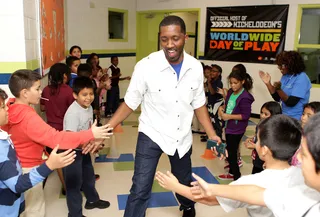 Bonding Time  - GRAMMY Foundation Senior Events Director Joseph Langford having fun in a Soul Train line with the kids.   (Photo: Leon Bennett/BET/Getty Images for BET)