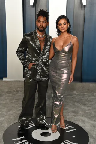 Miguel&nbsp;and&nbsp;Nazanin Mandi - Miguel and Nazanin Mandi are both giving us textured fab in their 2020 Vanity Fair Oscar Party attire.(Photo by John Shearer/Getty Images) (Photo by John Shearer/Getty Images)