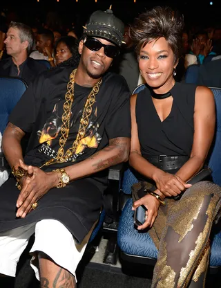 What's Love Got to Do With It? - Unlikely pals 2 Chainz and Angela Bassett caught up during the show.  &nbsp;(Photo: Kevin Mazur/Getty Images for BET)