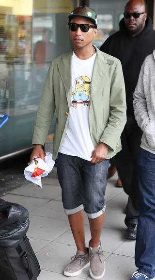 Fashion-Focused Gent - The always stylish&nbsp;Pharrell Williams arrives at Tegel airport for Mercedes-Benz Fashion Week in Berlin.&nbsp; (Photo: WENN.com)