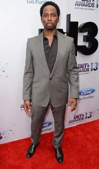 Lost and Found - Actor Harold Perrineau arrives at the 2013 BET Awards Ford Red Carpet in a gray suit and dark gray dress shirt.   (Photo: Jason Merritt/BET/Getty Images for BET)