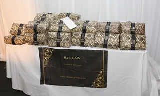 RJS Law Let's the Dough Flow - Tax law firmRJS Law &nbsp;gifted a $2500 gift certificate wrapped in a luxurious White Waffle kimono bath robe. For more go to irssolution.com   (Photo: Imeh Akpanudosen/BET/Getty Images for BET)