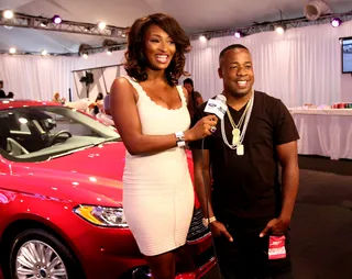 Gotti Boy - Rapper Yo Gotti connects with Toccara at the Hot Spot. Gotti made sure his jewelry lit up the place like no one else.  (Photo: Maury Phillips/BET/Getty Images for BET)