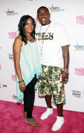 Coupled Up - NFL player Thomas Davis and wife Kelly Stokes make a cute couple on the carpet. (Photo: Paul A. Hebert/Getty Images for BET)