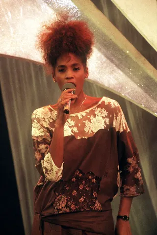 Fresh-Faced - In the early '80s, Whitney Houston started working as a model after a photographer saw her perform with her gospel singing mother, Cissy Houston, at Carnegie Hall. Her girl-next door charm and gorgeous looks made her one of the most sought out models of that time.(Photo: dpa /Landov)