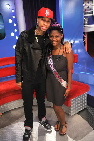 Tyga and the Birthday Girl - Tyga posed for a photo with a fan.(Photo by Brad Barket/PictureGroup)