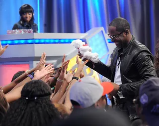 Having Fun With the Audience - Johnny Gill came with gifts. (Photo: Brad Barket/PictureGroup)