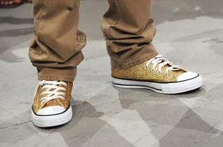 The Shoes - Check out Tyga's fly gold sneakers. (Photo: Brad Barket/PictureGroup)
