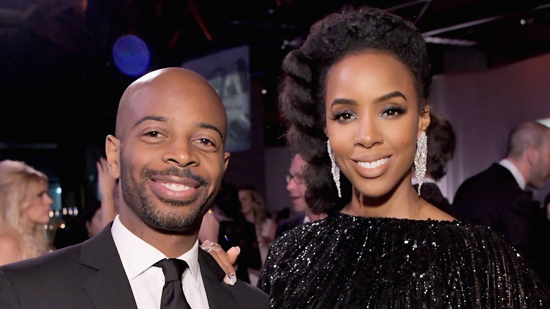 Kelly Rowland and Tim Weatherspoon on BET Buzz 2021.