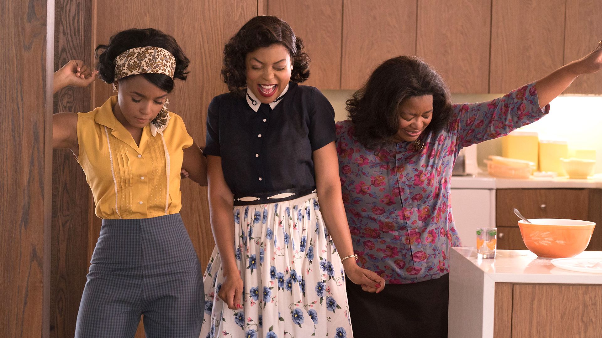 DF-03283_R3 - Mary Jackson (Janelle Monae, left), Katherine Johnson (Taraji P. Henson) and Dorothy Vaughan (Octavia Spencer) celebrate their stunning achievements in one of the greatest operations in history. (Photo: Hopper Stone / Twentieth Century Fox Film Corporation)