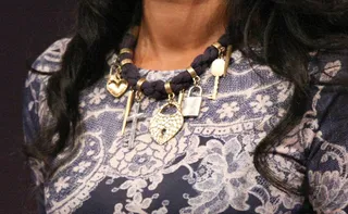 Charmed - Angie Simmons rocks a necklace with gold charms.(Photo:&nbsp; Bennett Raglin/Getty Images for BET)