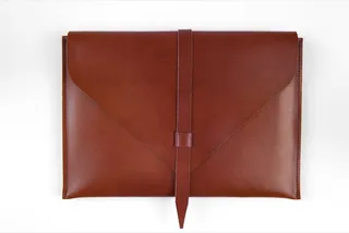 Brown Leather Laptop Case ($225) - This sleek sheath will protect his 13” laptop in grown man style.&nbsp;(Photo: Brika)