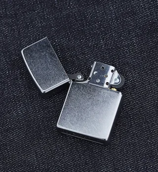 Zippo Lighter ($24) - Who has time for a plastic lighter? Not the dad on your shopping list. Give him this iconic lighter and watch his grown man swag soar.&nbsp;  (Photo: Zippo via Cool Material)