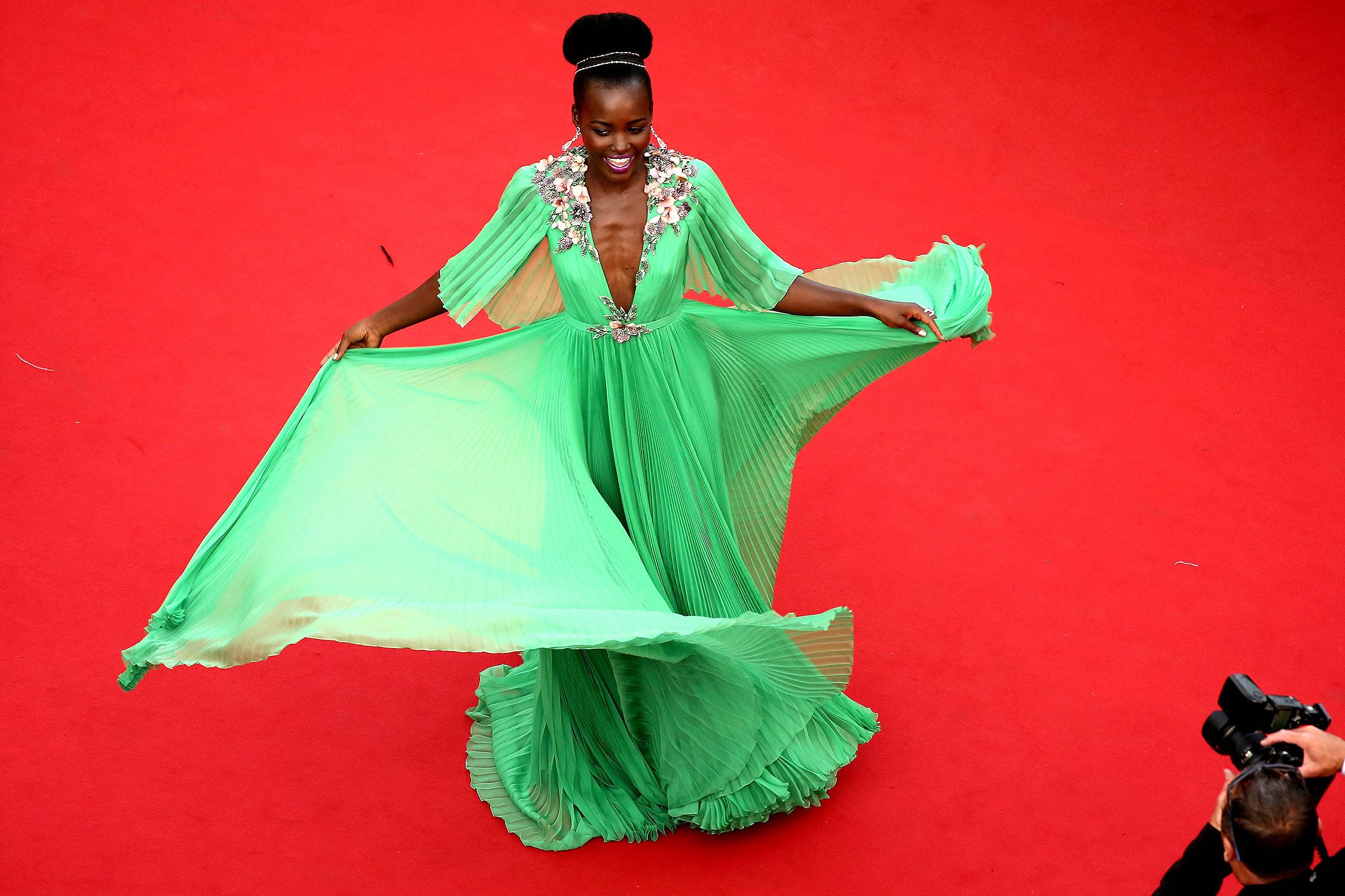 Twirl! - Here she - Image 2 from Lupita Nyong'o Is a Goddess in Green | BET