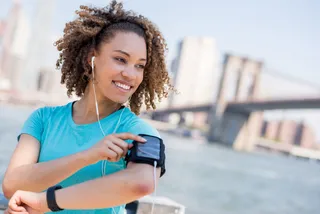 8. Her Must Have Fashion Accessory Is an Arm Band - (Photo: andresr/Corbis Images)