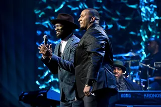 Host Rickey Smiley and Detroit Lions player Mike Daniels - (Photo by Mike Coppola/Getty Images for BET)