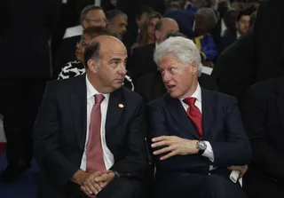 President Bill Clinton - Former President and current U.N. Special Envoy for Haiti Bill Clinton speaks with U.S. Ambassador to Haiti Kenneth H. Merten during the swearing-in ceremony.(Photo: AP Photo/Brennan Linsley)