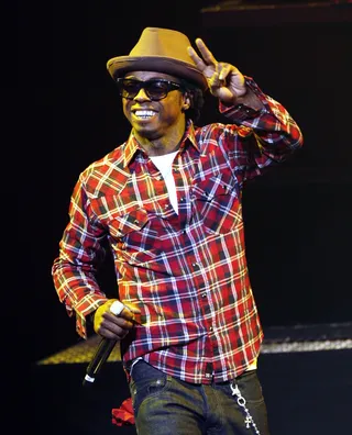 /content/dam/betcom/images/2011/05/Music-5.1-5.15/051211-music-lil-wayne.jpg