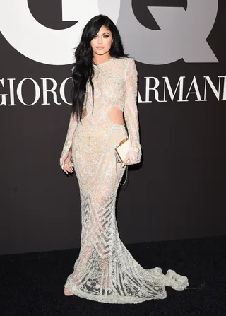 Kylie Jenner - The plump lipped cutie attends the same Grammys after-party in a&nbsp;shimmering ivory number with side cutouts by Steven Khalil.  (Photo: Jason Merritt/Getty Images for Armani)