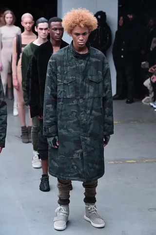 Kanye West x Adidas Originals - Don’t second-guess it: your man needs this camo overcoat in his repertoire.&nbsp; (Photo: Theo Wargo/Getty Images for adidas)