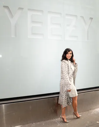 Proud Wife - Kim Kardashian&nbsp;poses outside the Adidas Store in Soho where&nbsp;Kanye West's new Adidas Originals Yeezy Boost sneakers are on display in the window in New York City.(Photo: Raymond Hall/GC Images)