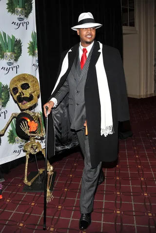 Carmelo Anthony - Raid your old man’s closet for the necessary pieces to pull off Melo’s dapper swag. Impersonating a Harlem gangster is just as sexy as it is cool. Be sure to swap out those hard-bottoms for a killer pair of shoes.&nbsp;  (Photo: Stephen Lovekin/Getty Images)