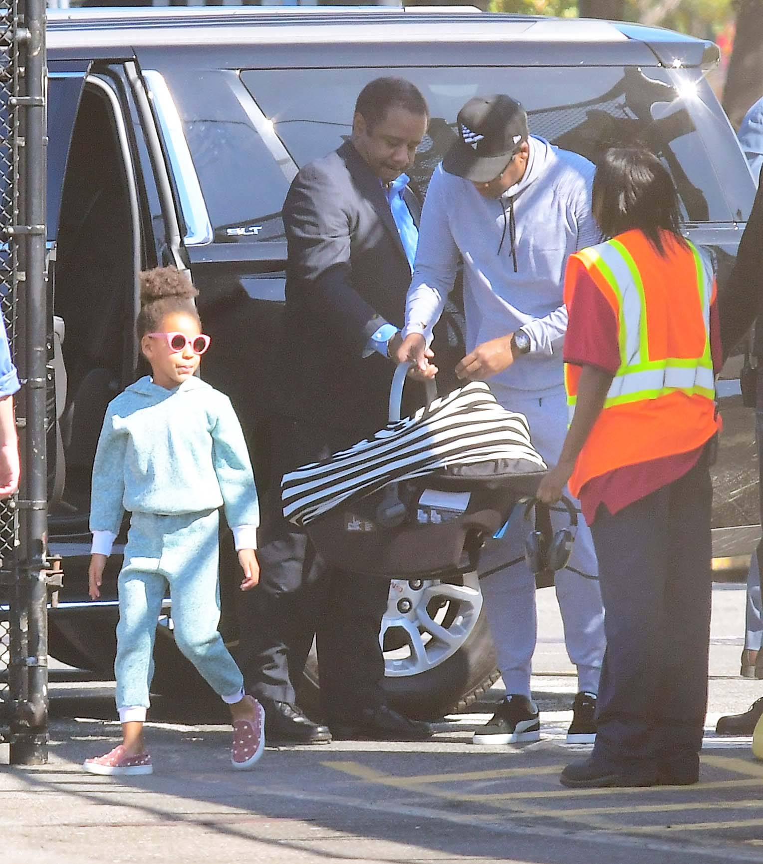 Mommy and Daddy! - Beyonce and Jay-Z seen out in public for the first time with their twins. The superstar couple were seen arriving at a heliport in New York City.(Photo: Splash News)