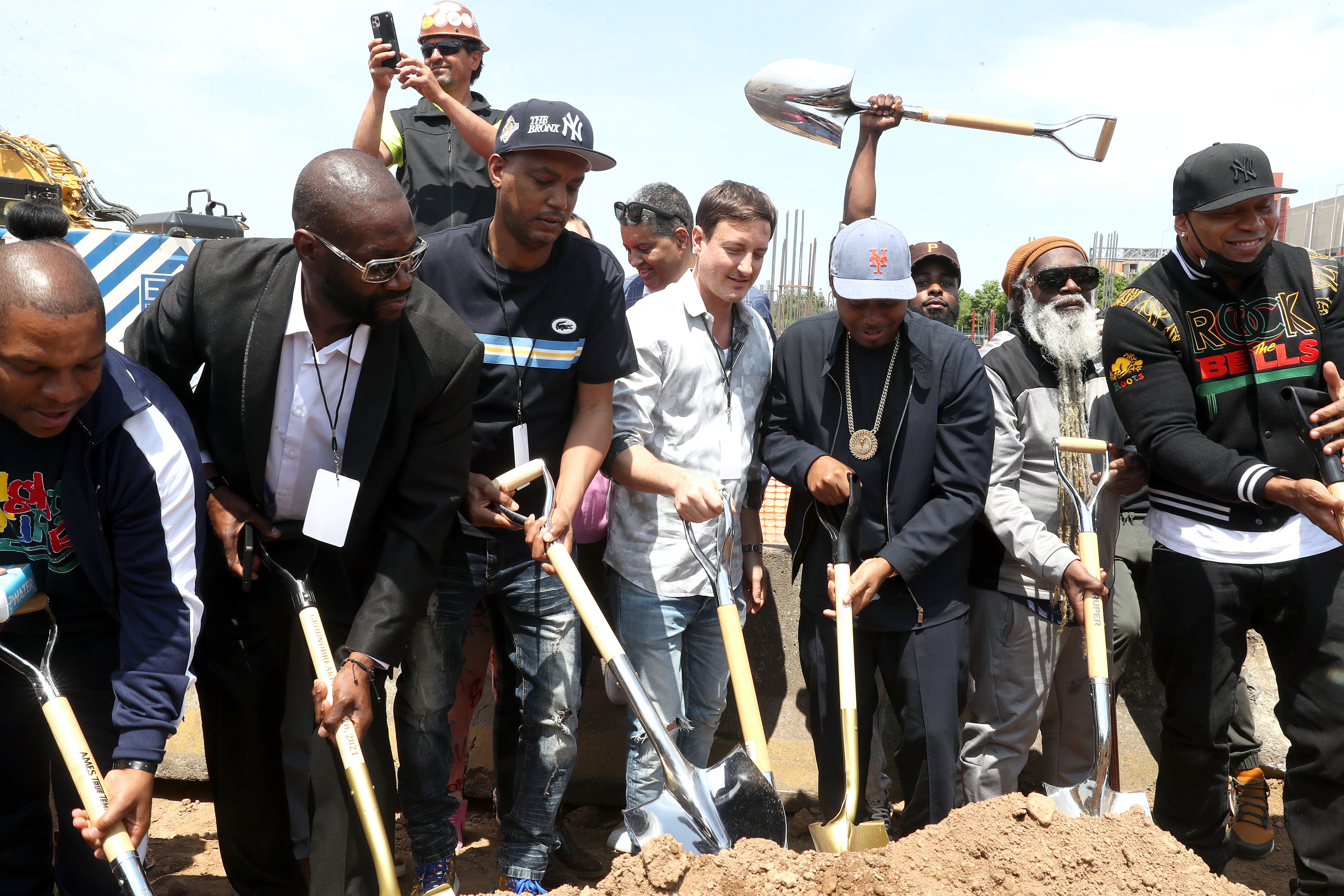 NEW YORK, NEW YORK - MAY 20: Vin Rock, Cutman LG, Peter Bittenbender, Nas, Paradise Gray, and LL Cool J attend the Universal Hip Hop Museum Groundbreaking Ceremony held in Bronx Point on May 20, 2021 in New York City. (Photo by Johnny Nunez/WireImage)