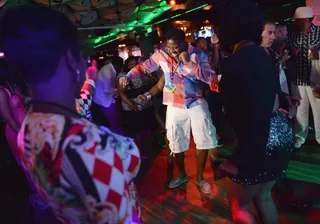 Weekend Goodtime - Guests get their groove on at the Grey Goose Cherry Noir Flavored Vodka VIP After Party during the 2013 BET Experience at the Conga Room at L.A. Live in Los Angeles.(Photo: Jason Kempin/BET/Getty Images for BET)