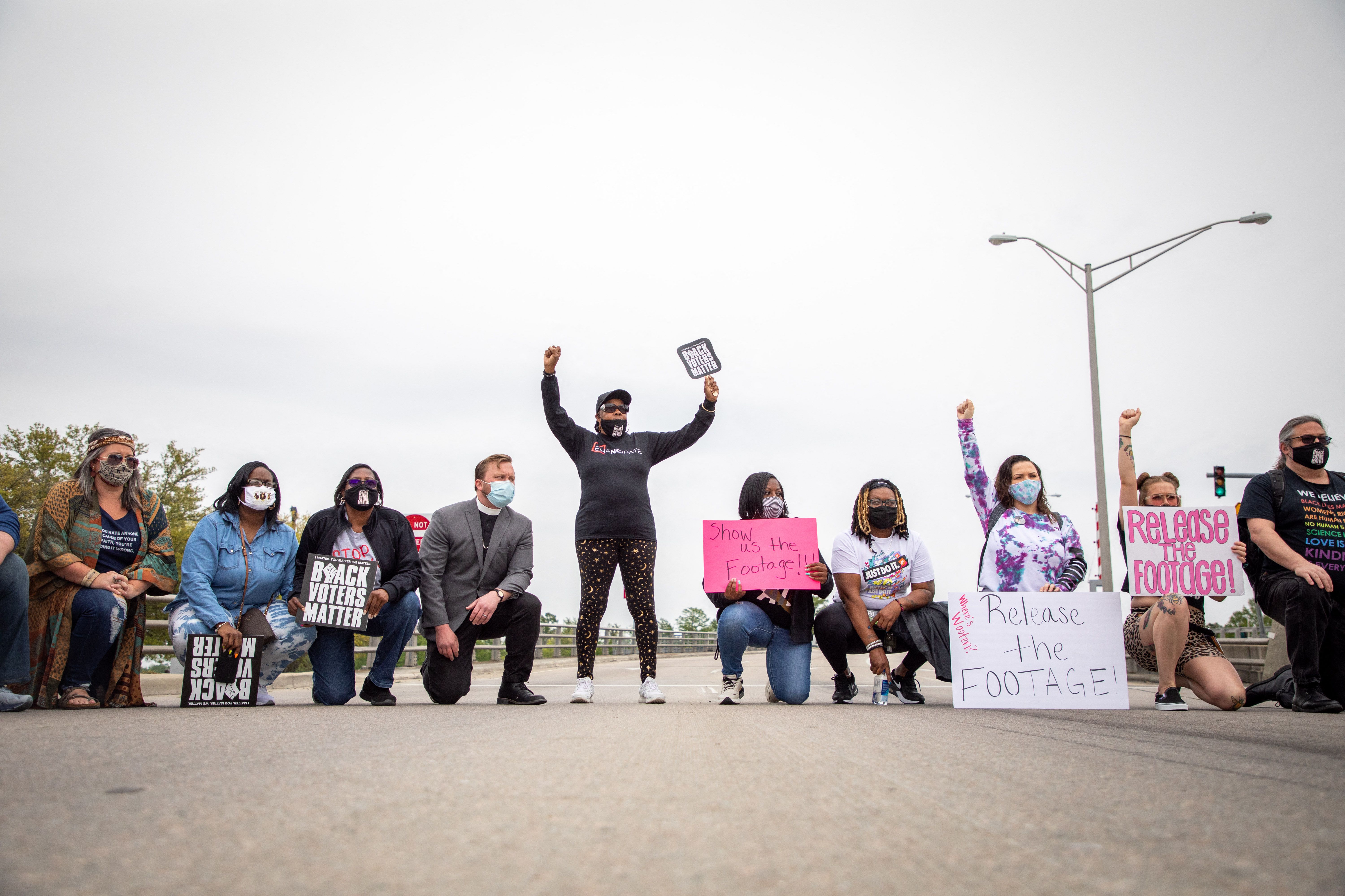 TOPSHOT - Protestors take to the streets for the 4th straight day calling for the release of body cam footage of the police killing of Andrew Brown Jr in Elizabeth City, North Carolina on April 24, 2021. - Eyewitnesses say that Brown Jr. was shot and killed by Pasquotank County Sheriff deputies as he was attempting to evade them while they were serving him a warrant. The department has released few details over the incident as members of the community ask for transparency and the release of body cam footage. (Photo by Logan Cyrus / AFP) (Photo by LOGAN CYRUS/AFP via Getty Images)