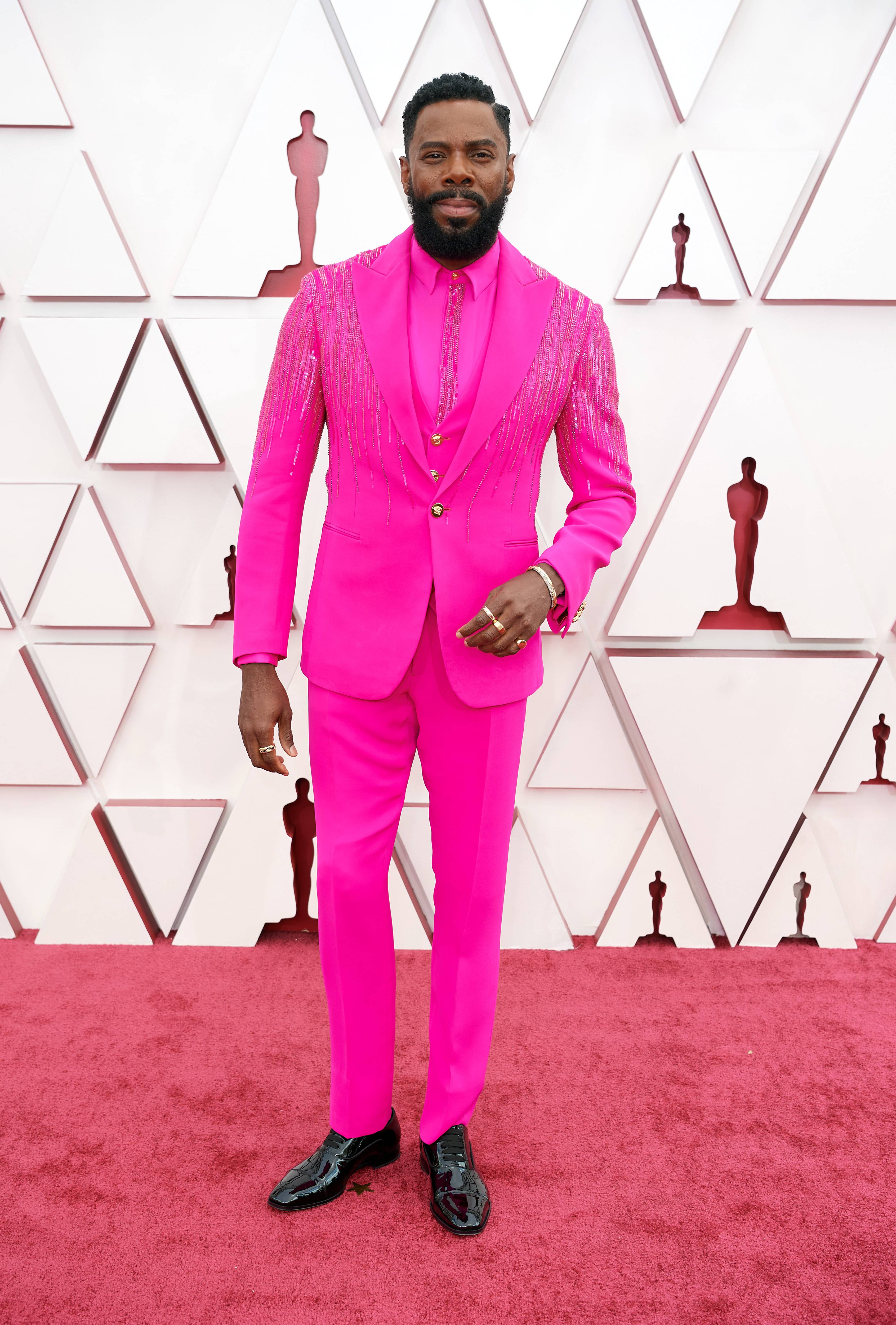 man in pink dress Real Black Men' Can Wear Pink, Mauve Or Whatever Pastel They Please And who doesnt want to be like that Idris in pink...! You're welcome