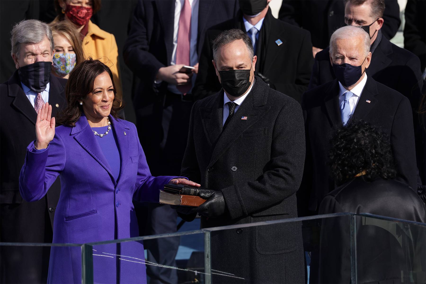 Inauguration Day 2021: Joe Biden and Kamala Harris - WASHINGTON, DC - JANUARY 20:&nbsp; Kamala Harris is sworn as U.S. Vice President by U.S. Supreme Court Associate Justice Sonia Sotomayor as her husband Doug Emhoff looks on at the inauguration of U.S. President-elect Joe Biden on the West Front of the U.S. Capitol on January 20, 2021 in Washington, DC.&nbsp; During today's inauguration ceremony Joe Biden becomes the 46th president of the United States. (Photo by Alex Wong/Getty Images)