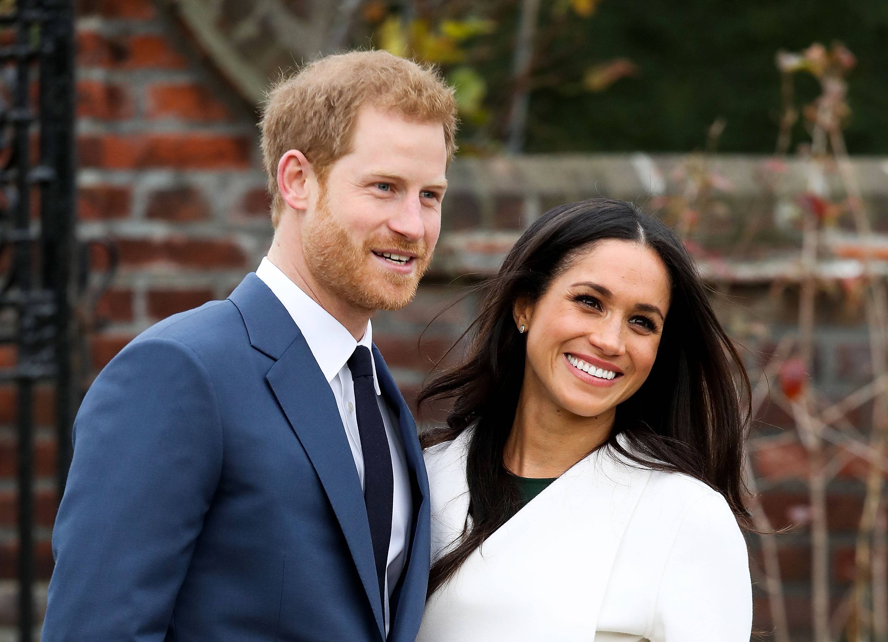 LONDON, ENGLAND - NOVEMBER 27:  Prince Harry and actress Meghan Markle during an official photocall to announce their engagement at The Sunken Gardens at Kensington Palace on November 27, 2017 in London, England.  Prince Harry and Meghan Markle have been a couple officially since November 2016 and are due to marry in Spring 2018.  (Photo by Chris Jackson/Chris Jackson/Getty Images)