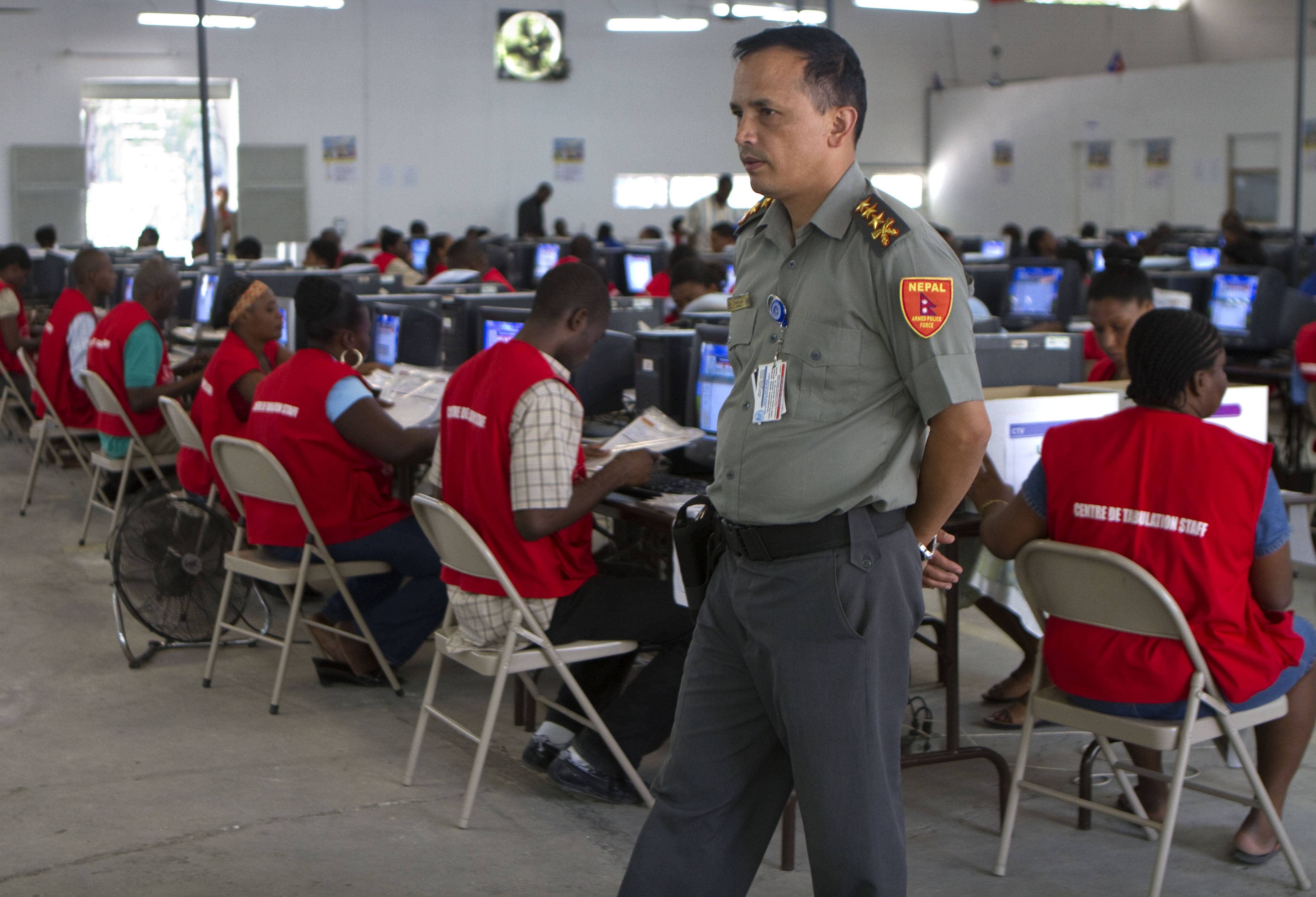 Results Postponed - Haiti postponed the announcement of preliminary results of their presidential election to April 4 because of alleged voter fraud. Gaillot Dorsinvil, president of Haiti's Provisional Electoral Council, said that officials found a "high level" of fraud and irregularities at the tabulation center in the capital city of Port-au-Prince. (Photo: AP Photo/Dieu Nalio Chery)