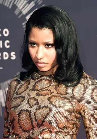 She’ll win an award and shade until it's dark outside. - Like that time she was awarded as Best Female Hip Hop artist and threw casual shade.(Photo: Jason Merritt/Getty Images for MTV)