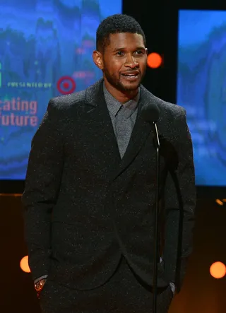 Usher's New Look - R&amp;B superstar Usher presents scholarships to deserving students through his New Look foundation.&nbsp;(Photo: Mark Davis/Getty Images for BET)