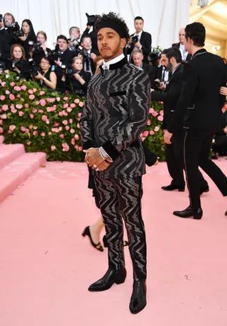 Lewis Hamilton in Tommy Hilfiger - (Photo: Dimitrios Kambouris/Getty Images for The Met Museum/Vogue)&nbsp;