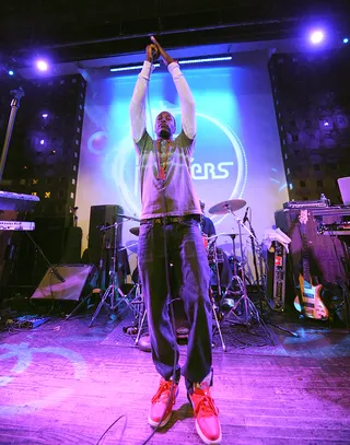 Hands Up High - Transparent has an emotional moment during his set at the BET Music Matters January showcase.&nbsp;(Photo: Brad Barket/BET/Getty Images for BET)