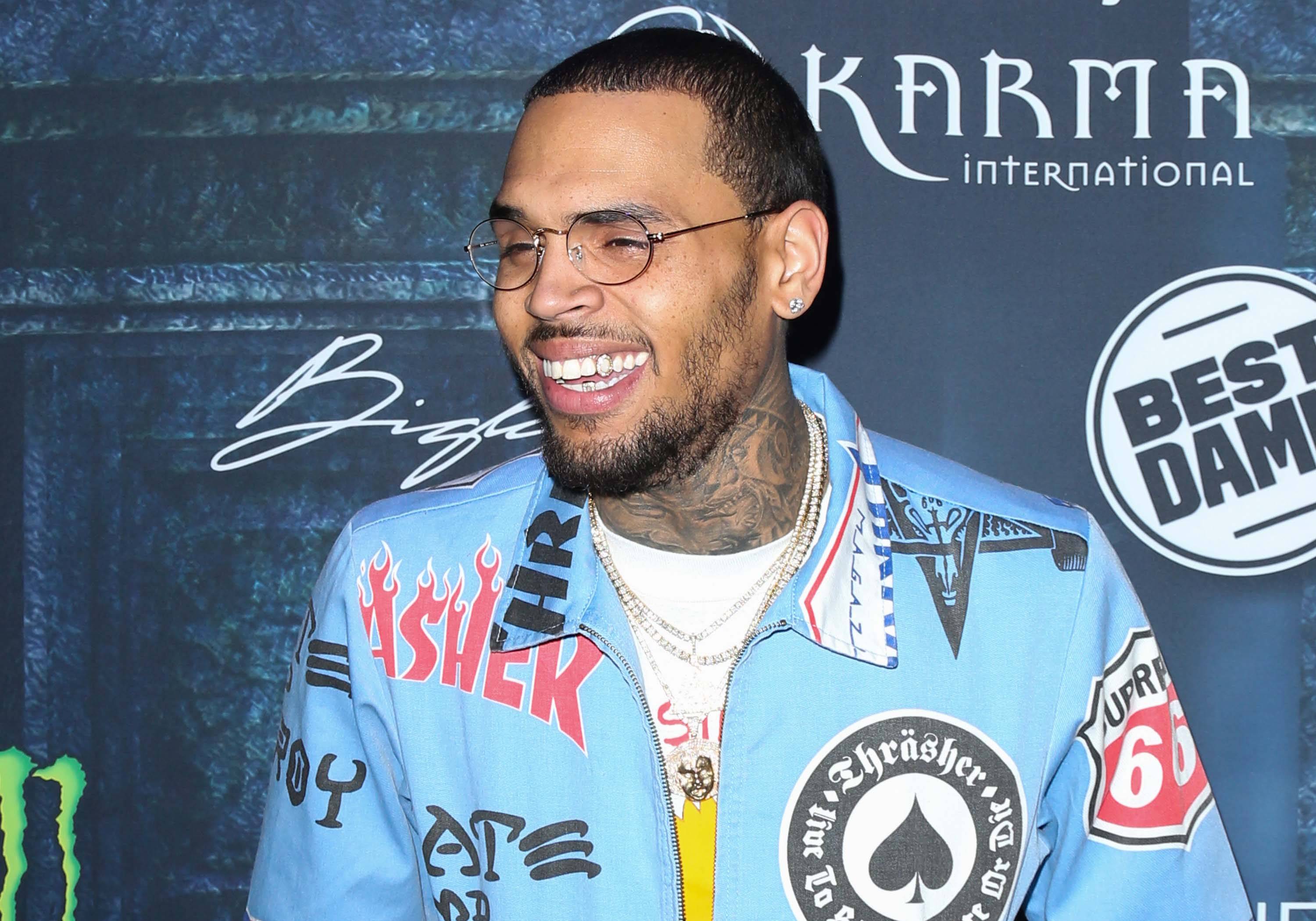 Chris Brown - The Heartbreak on a Full Moon crooner spent a modest $6,000 on his diamond-encrusted mouthpiece.(Photo:&nbsp;Paul Archuleta/FilmMagic)&nbsp;