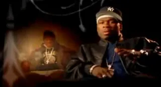 50 Cent - Leave it to Fif to subtly but hilariously transform Chris's melancholic plea &quot;God give me style&quot; from Coldplay's &quot;God Put a Smile Upon Your Face&quot; to the cocky &quot;God gave me style&quot; on his 2005 song of the same name. &nbsp;&nbsp;&nbsp;(Photo: Interscope Records)