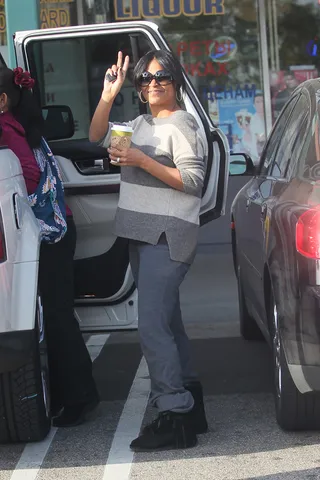 Morning Mama - Nia Long returns to her car with her morning coffee and her new baby after shopping for groceries at Whole Foods in Los Angeles.&nbsp;&nbsp; (Photo: Owen Beiny/WENN.com)