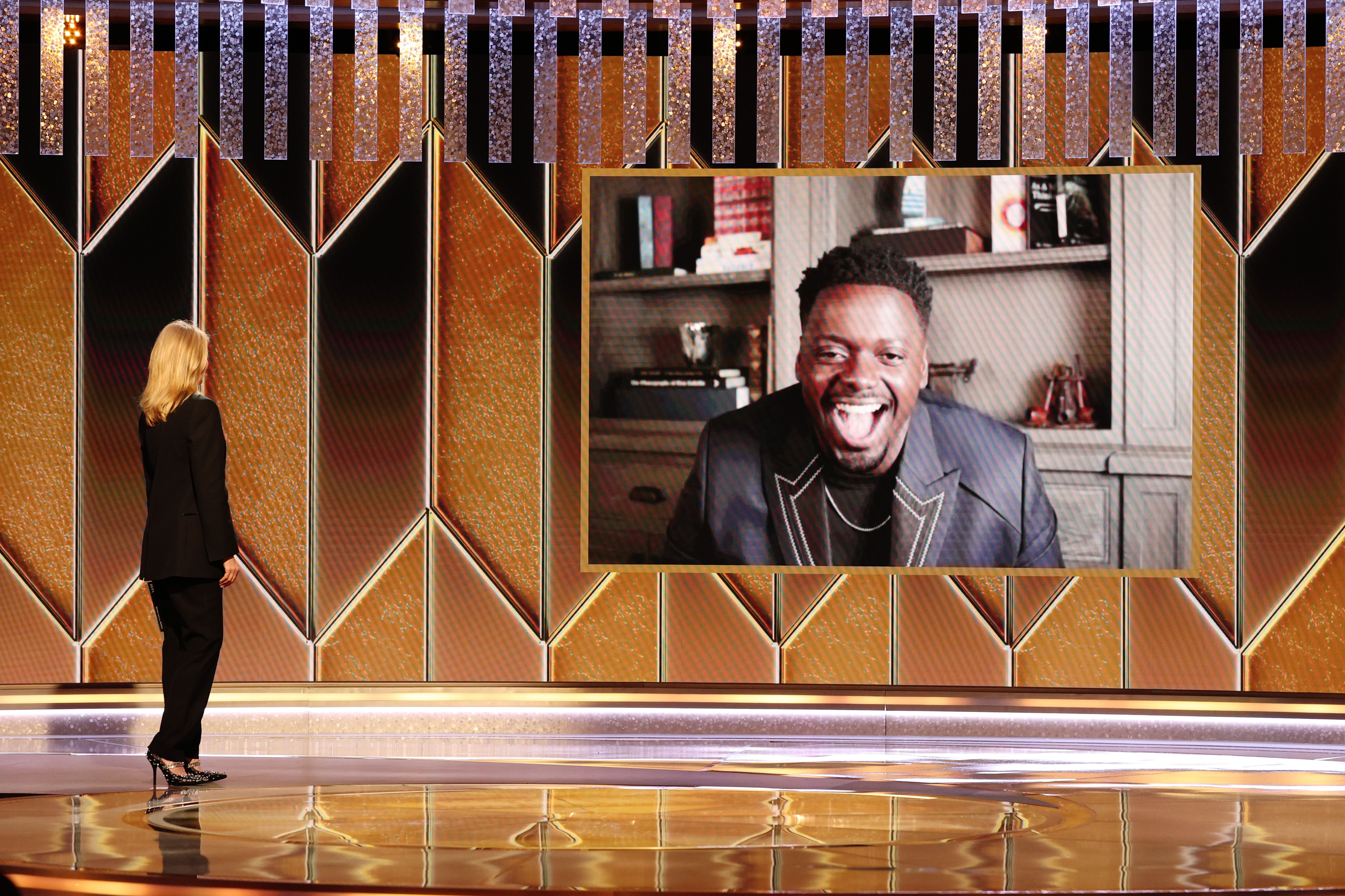BEVERLY HILLS, CALIFORNIA: 78th Annual GOLDEN GLOBE AWARDS -- Pictured: (l-r) Laura Dern presents the Best Supporting Actor - Motion Picture award for âJudas and the Black Messiahâ to winner Daniel Kaluuya (accepting via video) onstage at the 78th Annual Golden Globe Awards held at The Beverly Hilton and broadcast on February 28, 2021 in Beverly Hills, California. -- (Photo by Christopher Polk/NBC/NBCU Photo Bank via Getty Images)