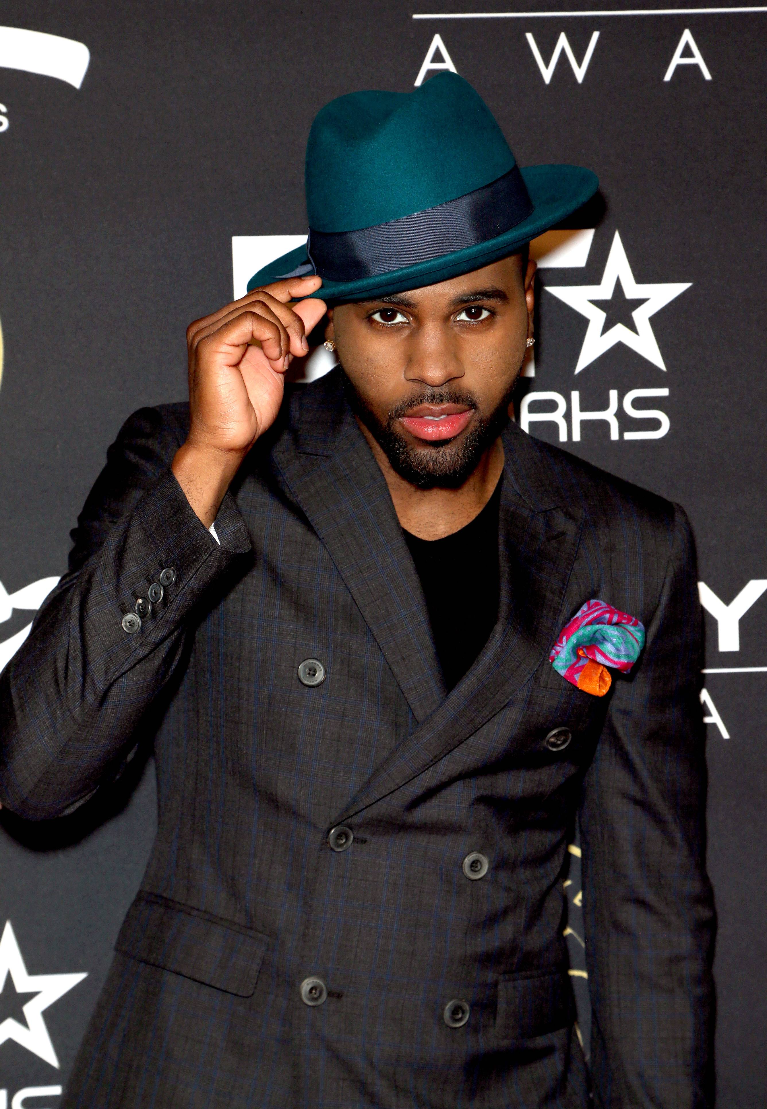 You Got the Look  - Following his hit “Want to Want Me,” the pop singer came through to the red carpet killin' it with a classic man ensemble. A dash of color here and all black everywhere else. (Photo: Bryan Steffy/BET/Getty Images)