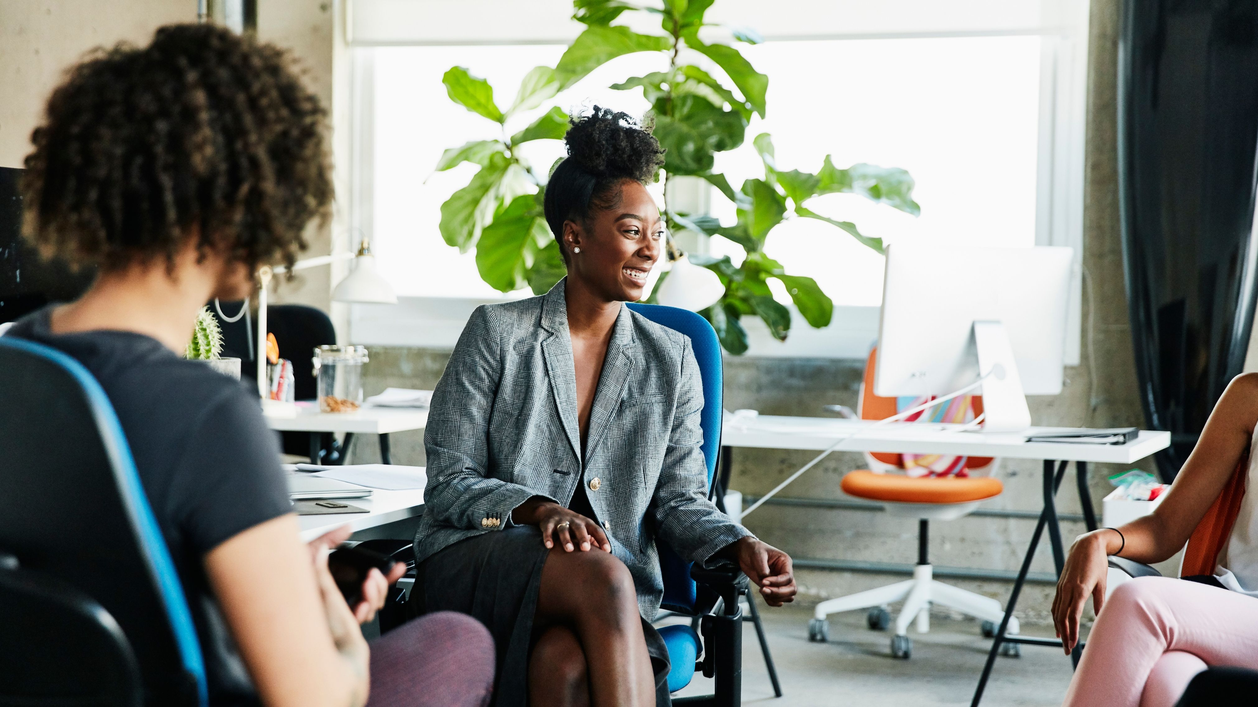 Women sitting together.