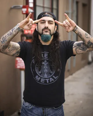 /sitewide/flipbooks/img/shows/that_metal_show_10/1001/TMS-1001-MikePortnoy_Tattoos.jpg