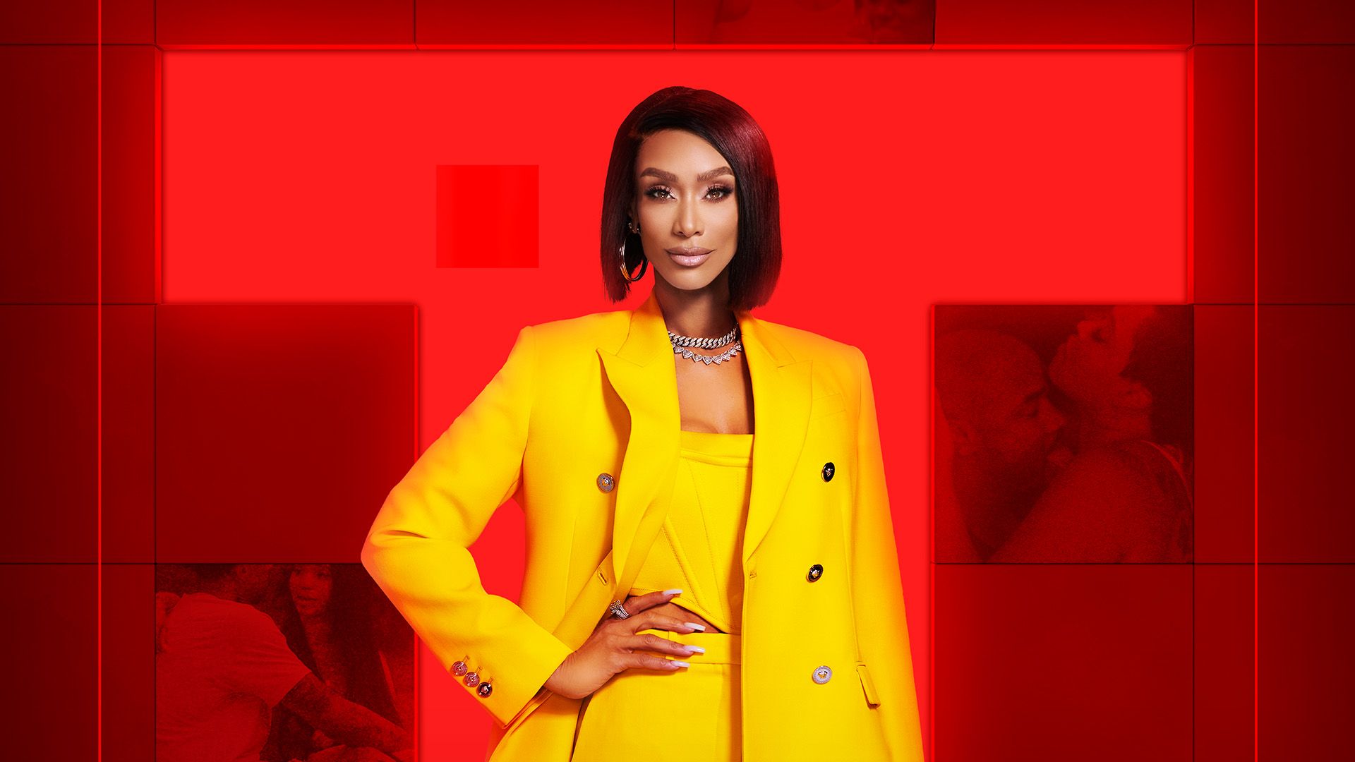 Host Tami Roman poses in front of a red background.